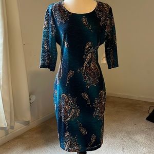 Teal blue pattern dress.